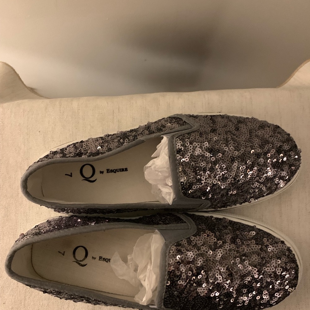 Greyish/silver sequined slip on sneakers.